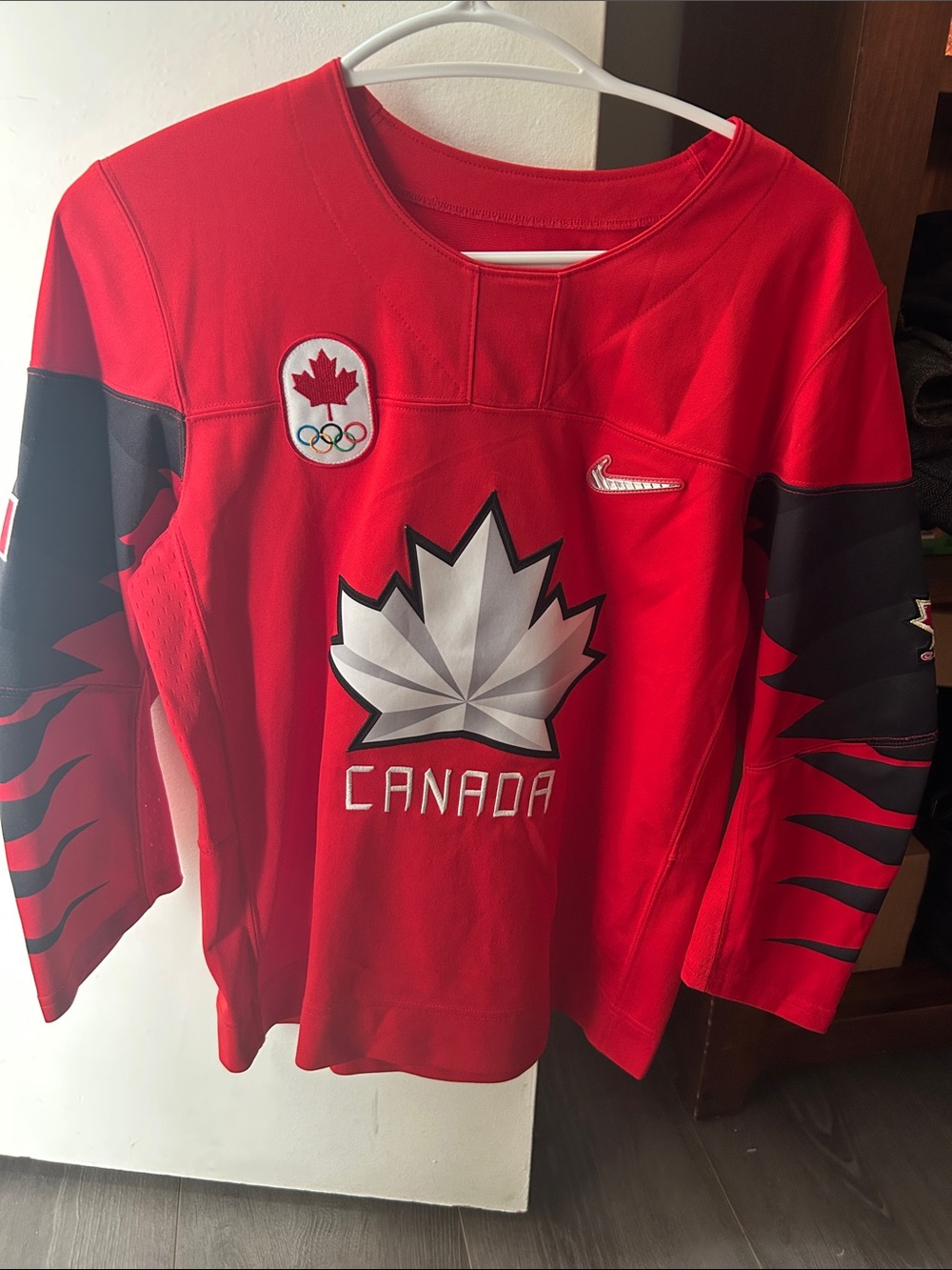 Nike Red Canada Hockey Jersey with Black Sleeve Accents